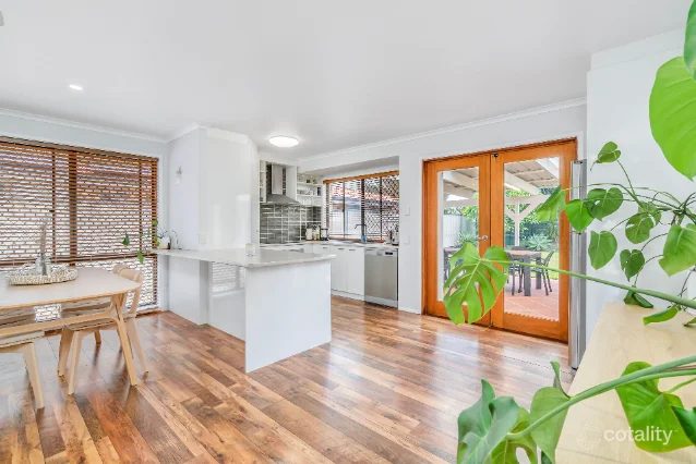 Elanora main house kitchen with timber floors and French doors